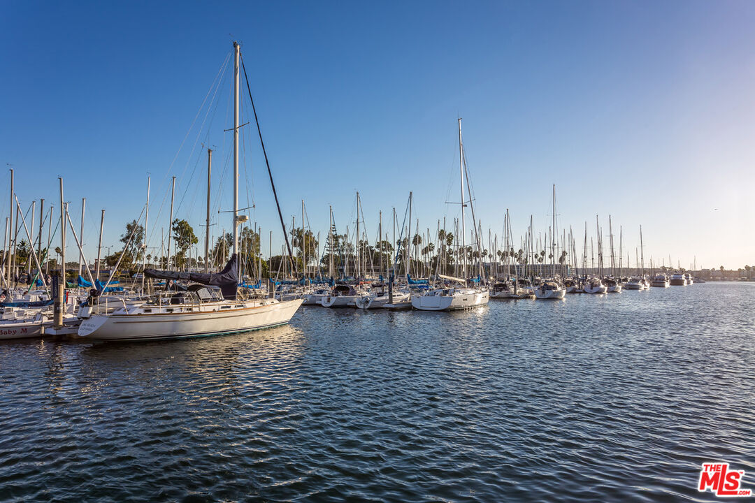 4351 Alla Road, Unit 8 Marina del Rey, CA 90292 - Photo 30 of 31 a view of a lake with boats next to a bridge