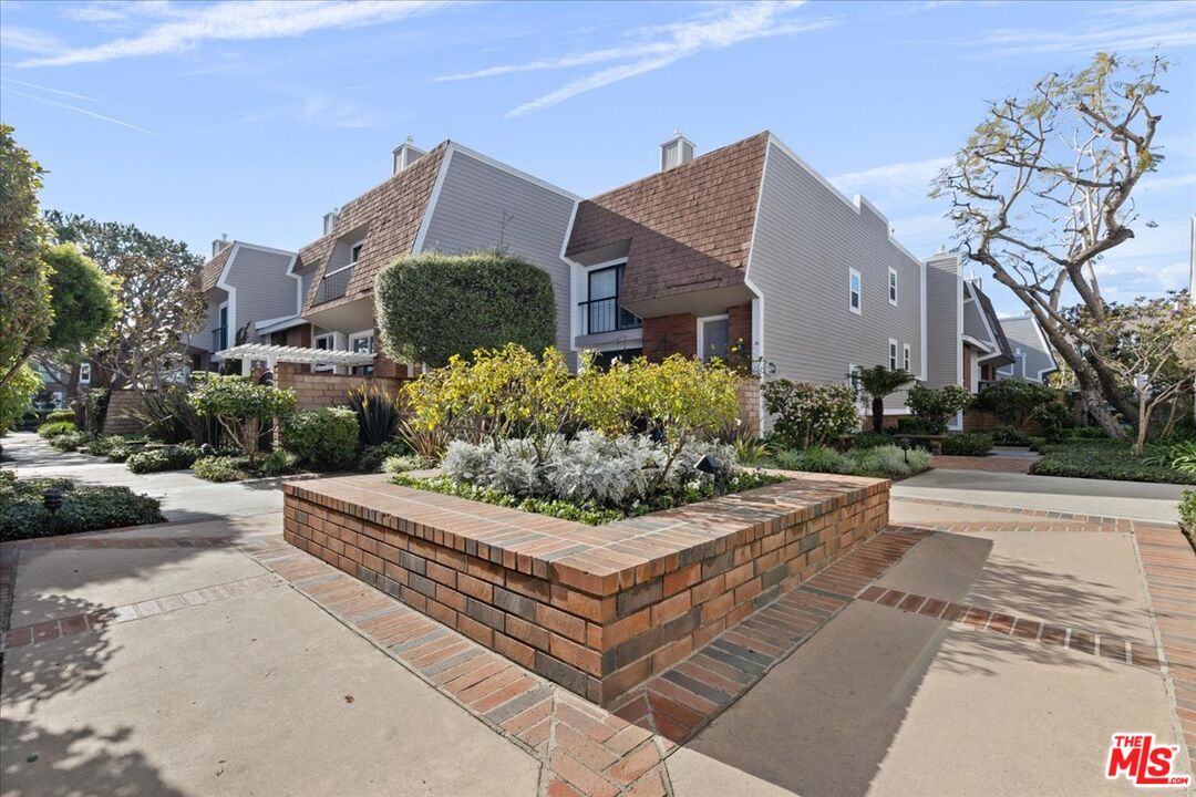 4351 Alla Road, Unit 8 Marina del Rey, CA 90292 - Photo 9 of 31 a front view of a house with garden