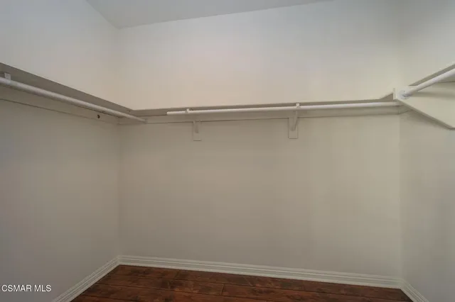 a view of an empty walk in closet