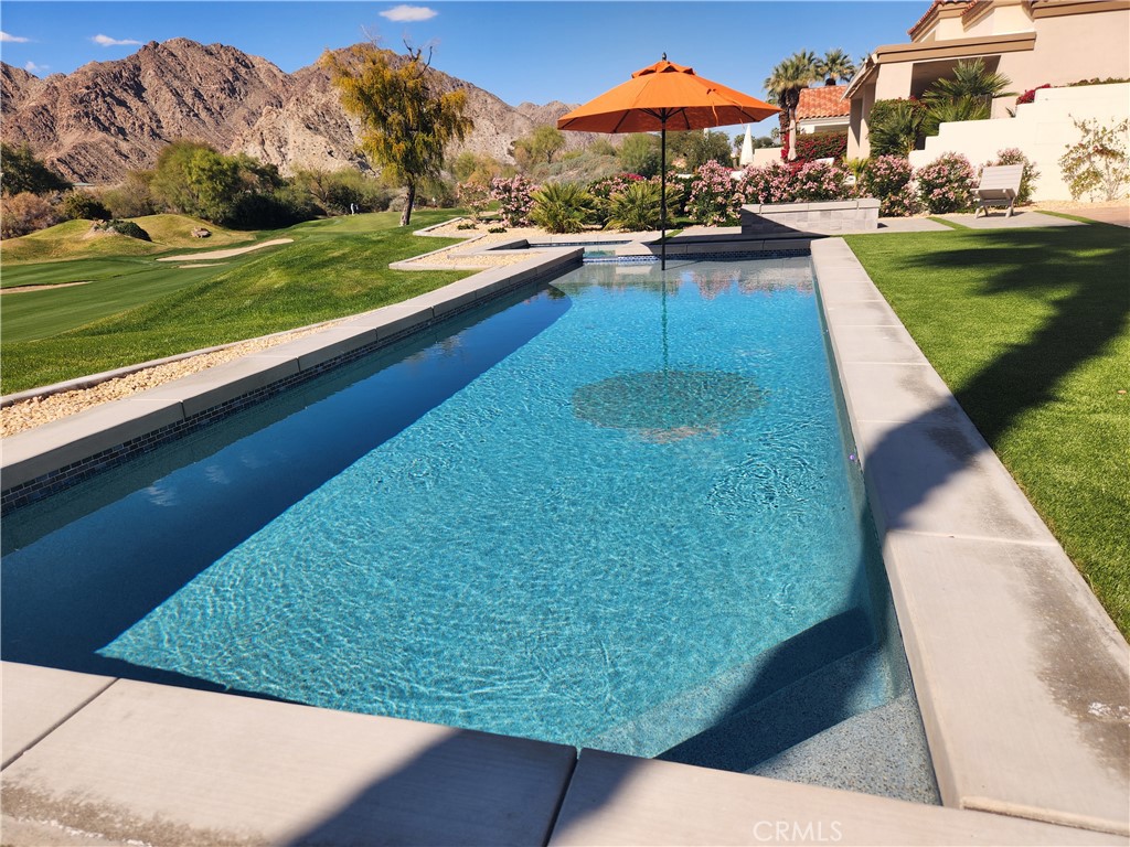 56989 Merion La Quinta, CA 92253 - Photo 16 of 37 a view of swimming pool from a yard