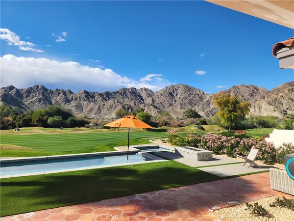 a living room with large windows