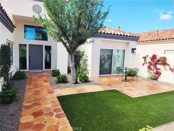 a front view of house with yard