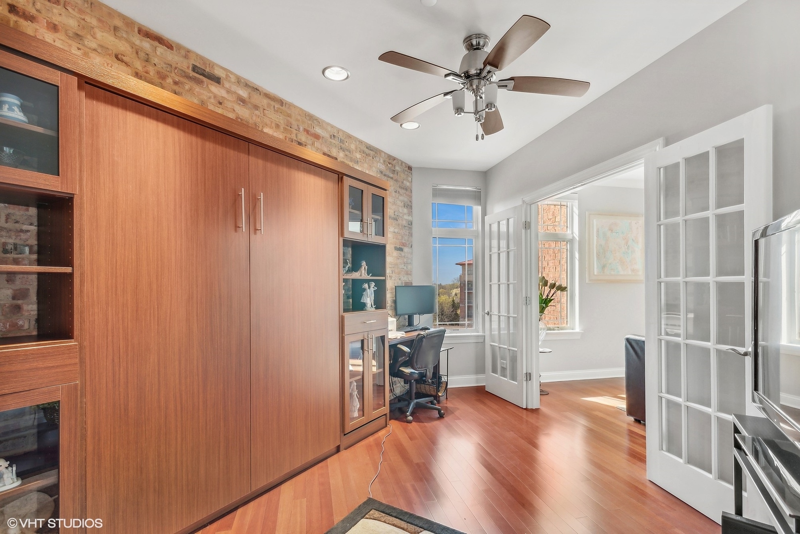 100 Prairie Park Drive, Unit 401 Wheeling, IL 60090 - Photo 12 of 29 a view of workspace with wooden floor and workspace