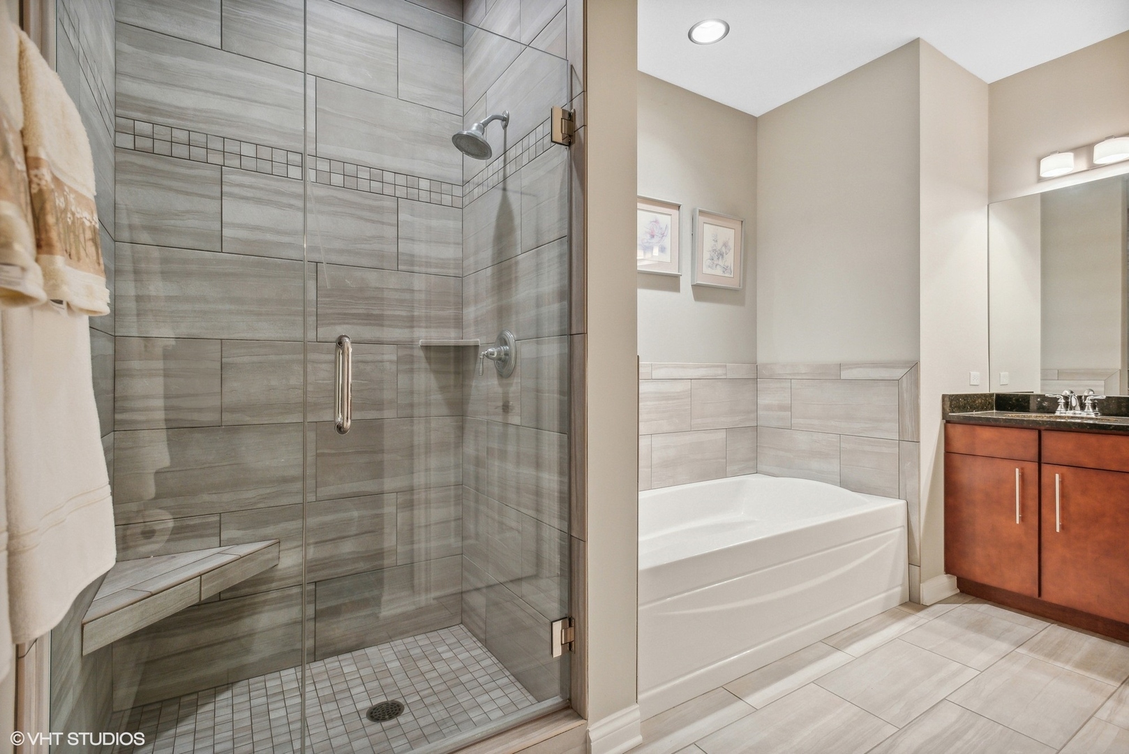 100 Prairie Park Drive, Unit 401 Wheeling, IL 60090 - Photo 18 of 29 a bathroom with a bathtub and a shower