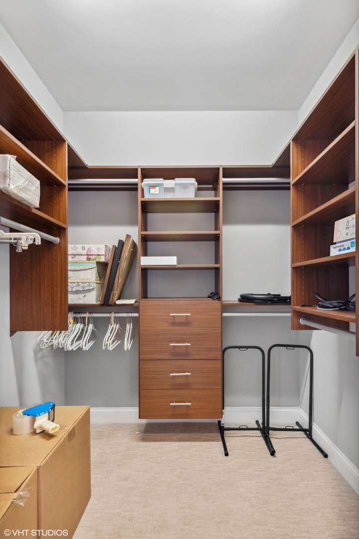 100 Prairie Park Drive, Unit 401 Wheeling, IL 60090 - Photo 19 of 29 a view of room with furniture and a window