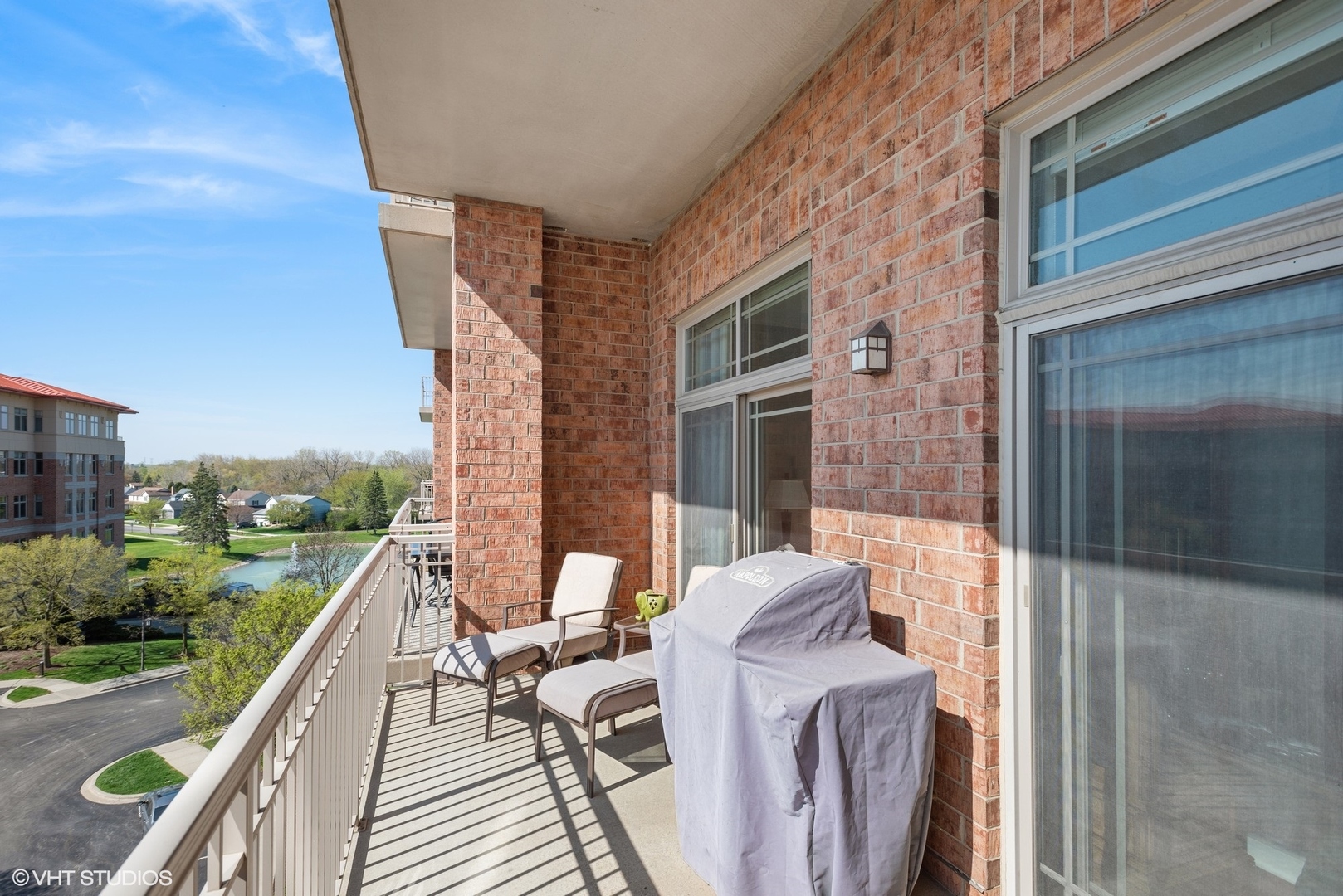 100 Prairie Park Drive, Unit 401 Wheeling, IL 60090 - Photo 20 of 29 a view of deck with patio