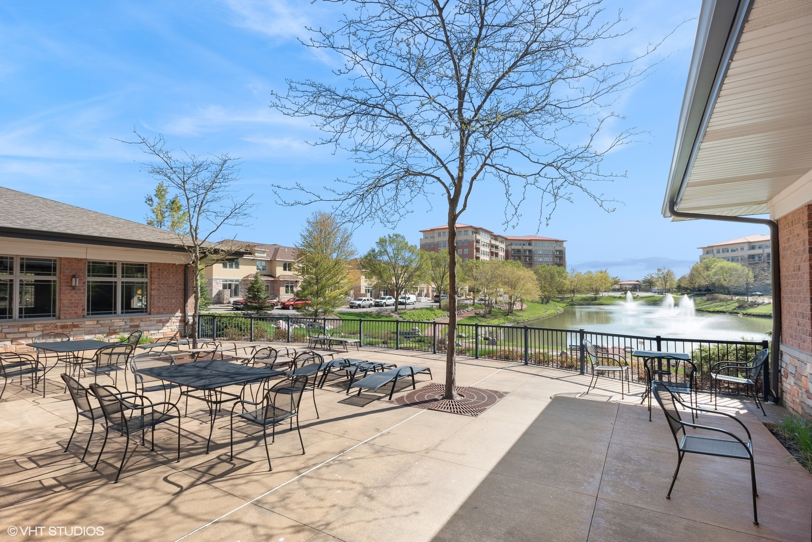 100 Prairie Park Drive, Unit 401 Wheeling, IL 60090 - Photo 26 of 29 a view of a patio with a table chairs and a patio