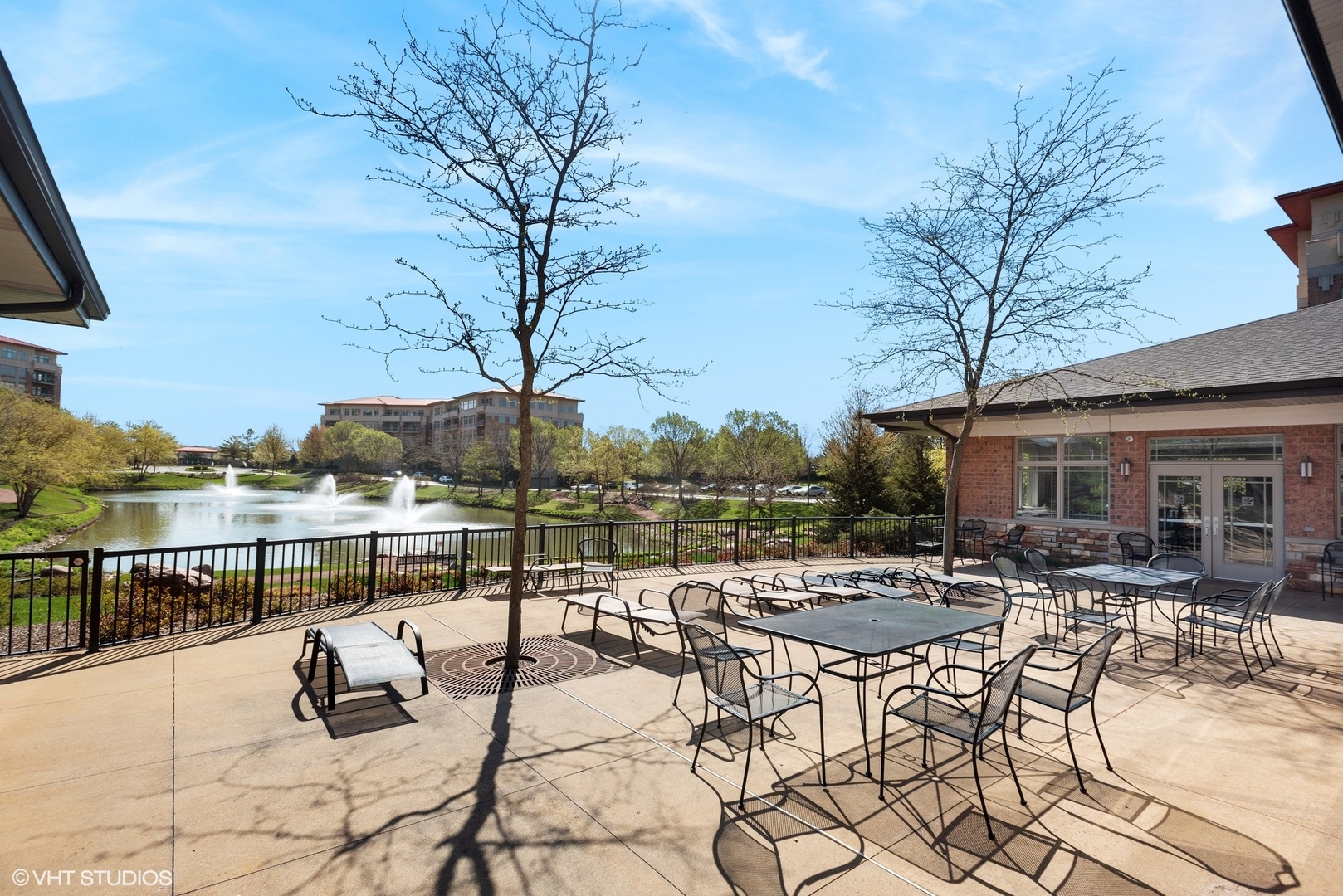 100 Prairie Park Drive, Unit 401 Wheeling, IL 60090 - Photo 27 of 29 a view of a swimming pool with chairs