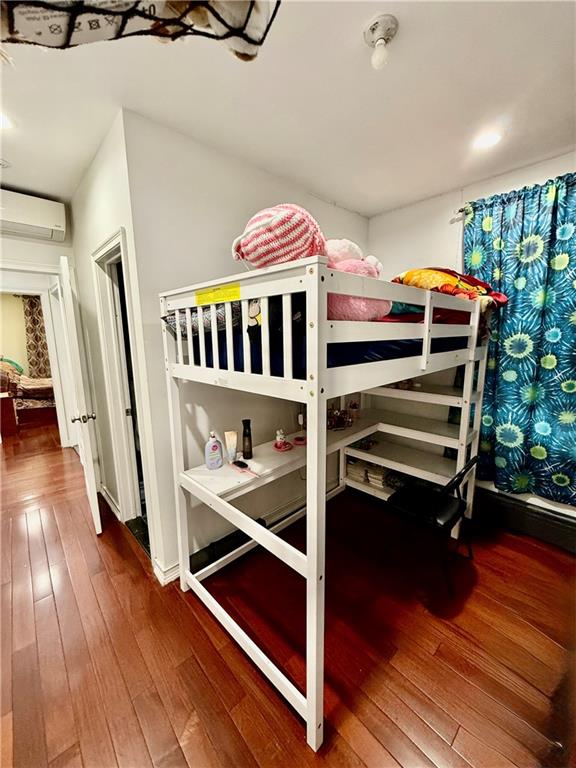 1117 Glenwood Road Brooklyn, NY 11230 - Photo 5 of 28 a room with furniture and wooden floor