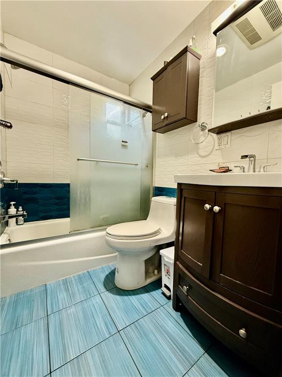 1117 Glenwood Road Brooklyn, NY 11230 - Photo 7 of 28 a bathroom with a sink toilet and shower