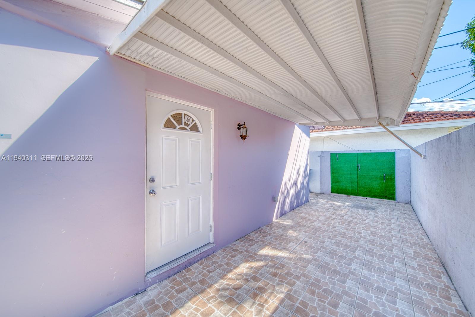 2741 Southwest 67th Avenue, Unit 1 Miami, FL 33155 - Photo 21 of 24 a view of a porch