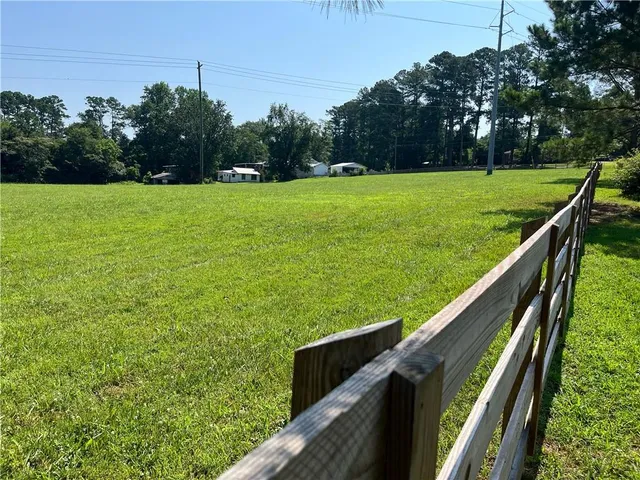 a view of a garden from a balcony
