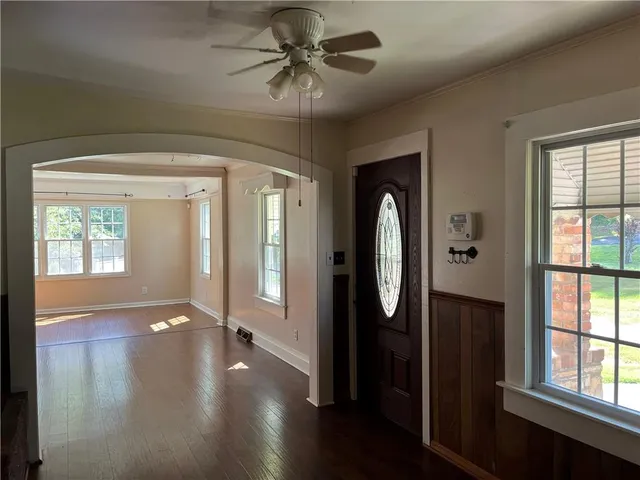 a view of gallery with wooden floor