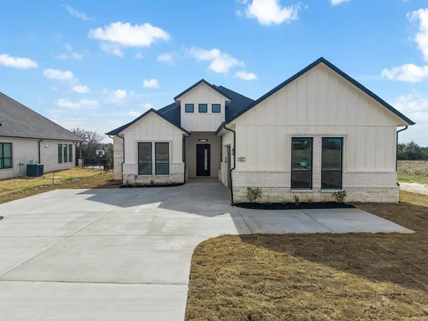 a view of front of house with garage