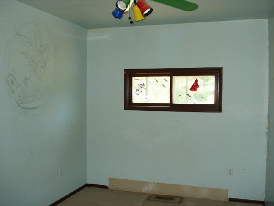 22413 Capron Road Capron, IL 61012 - Photo 6 of 6 a view of a small space with wooden floor and a window