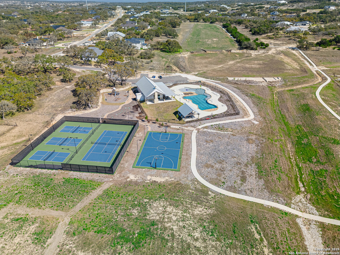 642 Butler Oaks Bulverde, TX 78163 - Photo 23 of 41 an aerial view of a house with a yard