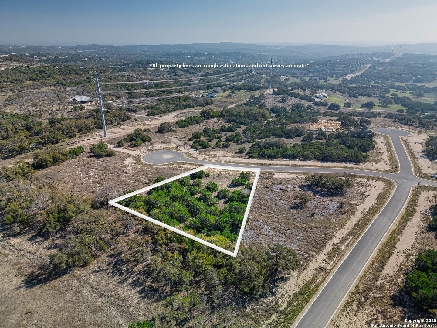 642 Butler Oaks Bulverde, TX 78163 - Photo 5 of 41 an aerial view of a house with a yard and lake view