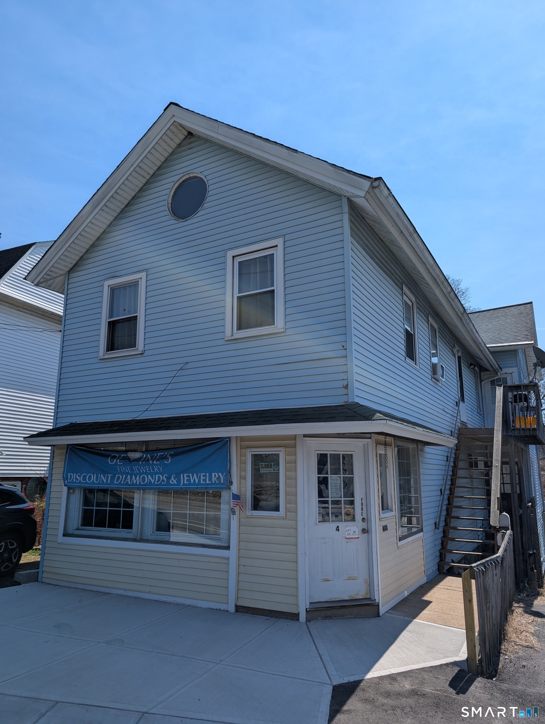 a front view of a house with a garage