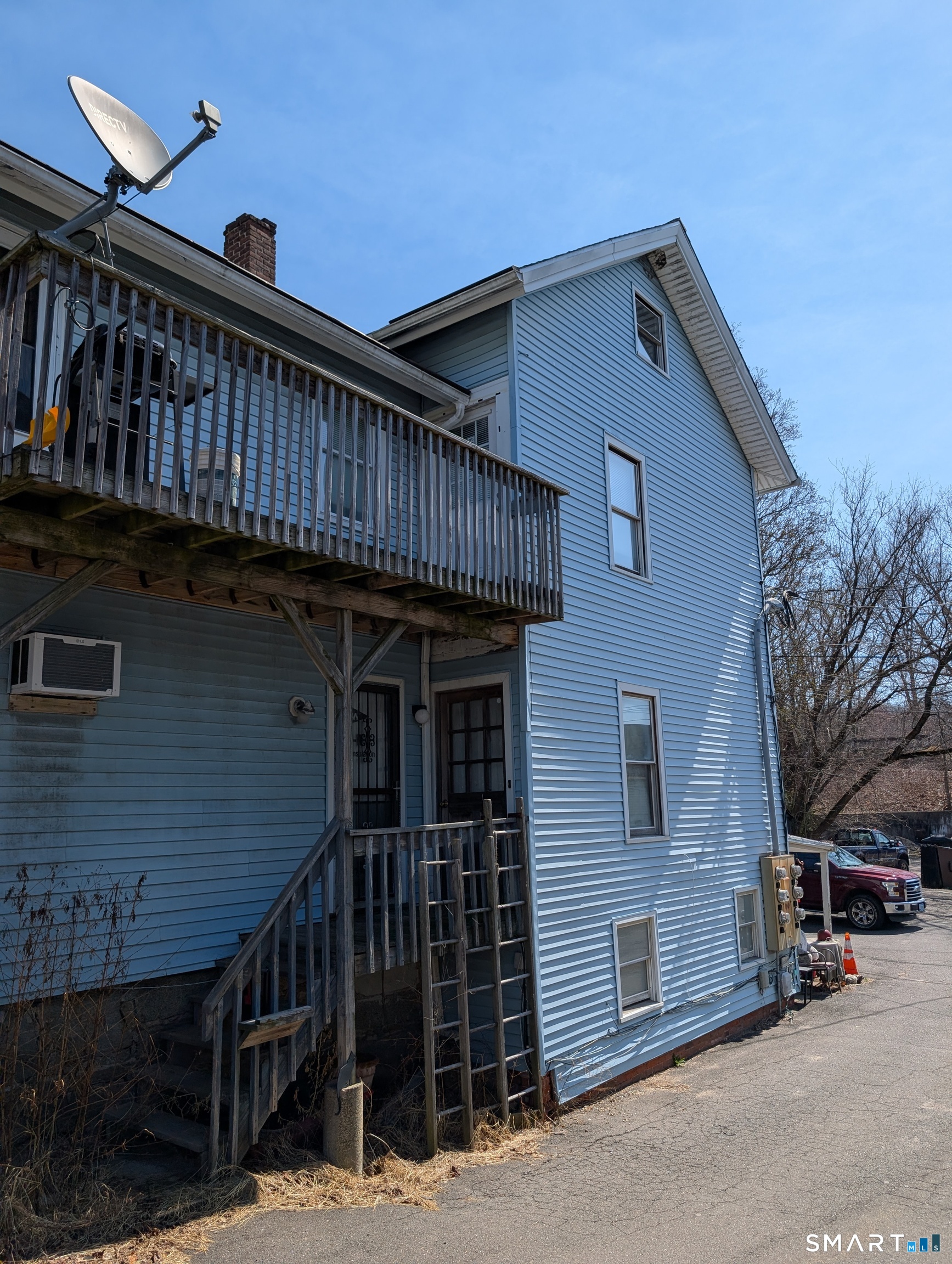 4 Summit Street East Hampton, CT 06424 - Photo 2 of 4 a view of a house with wooden fence