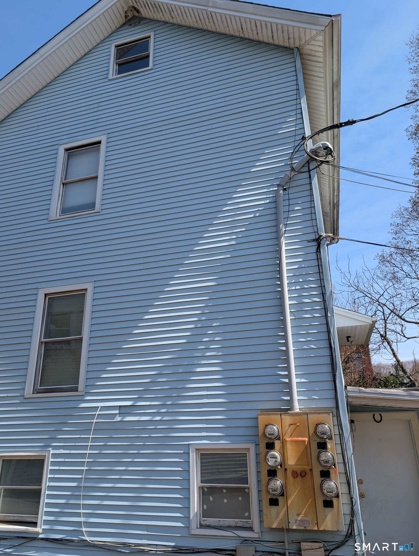4 Summit Street East Hampton, CT 06424 - Photo 3 of 4 a brick building with a door
