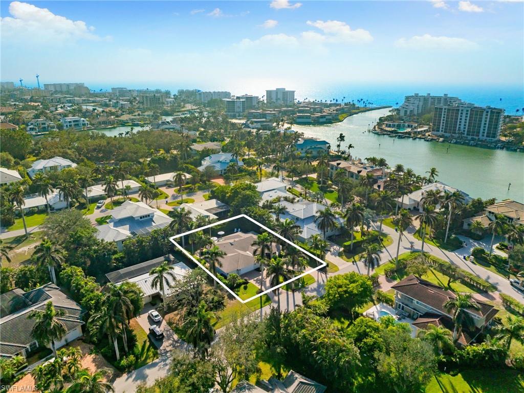 320 Putter Point Drive Naples, FL 34103 - Photo 1 of 1 Aerial view featuring a water view