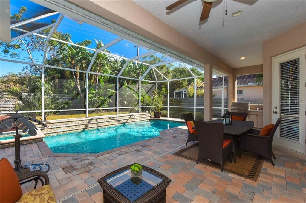 3921 Maravic Place Sarasota, FL 34231 - Photo 1 of 1 Peaceful outdoor living, large covered lanai.