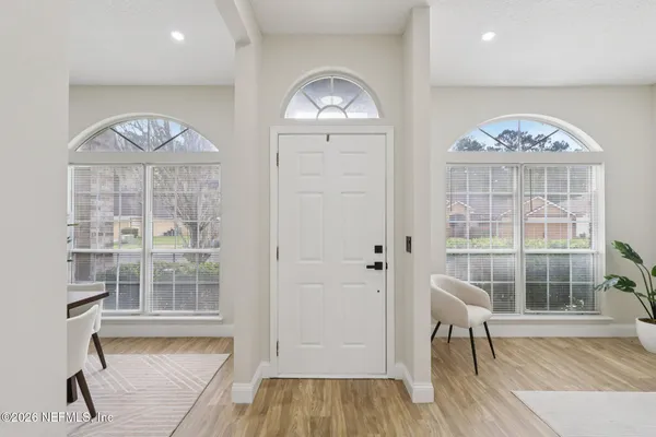 a view of a livingroom with furniture and window