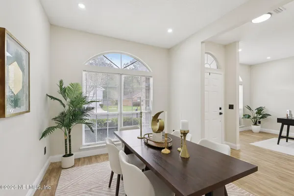 a workspace with furniture and window