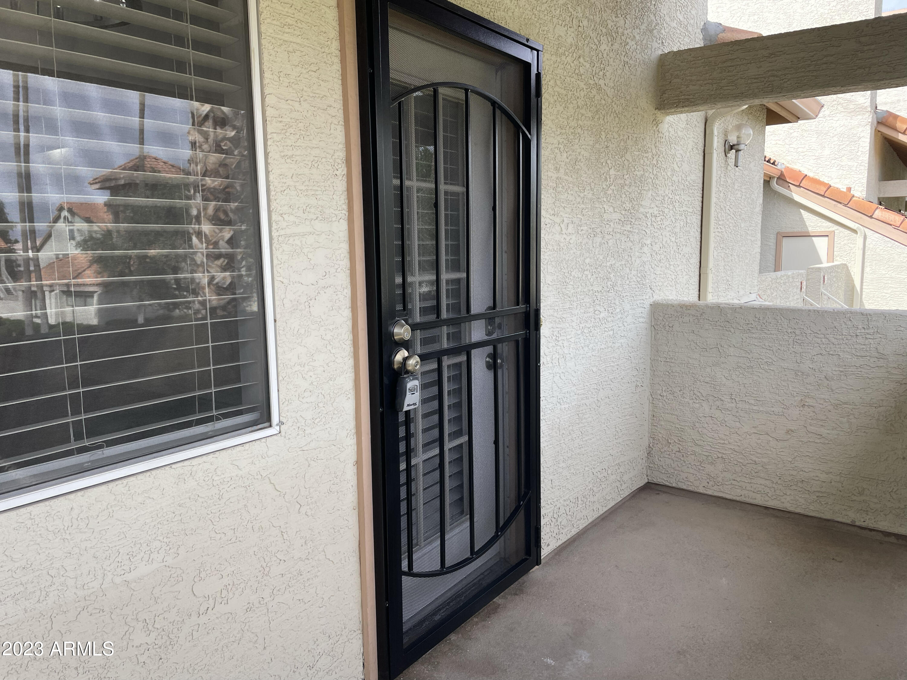 19820 North 13th Avenue, Unit 206 Phoenix, AZ 85027 - Photo 2 of 22 a view of a house with a door