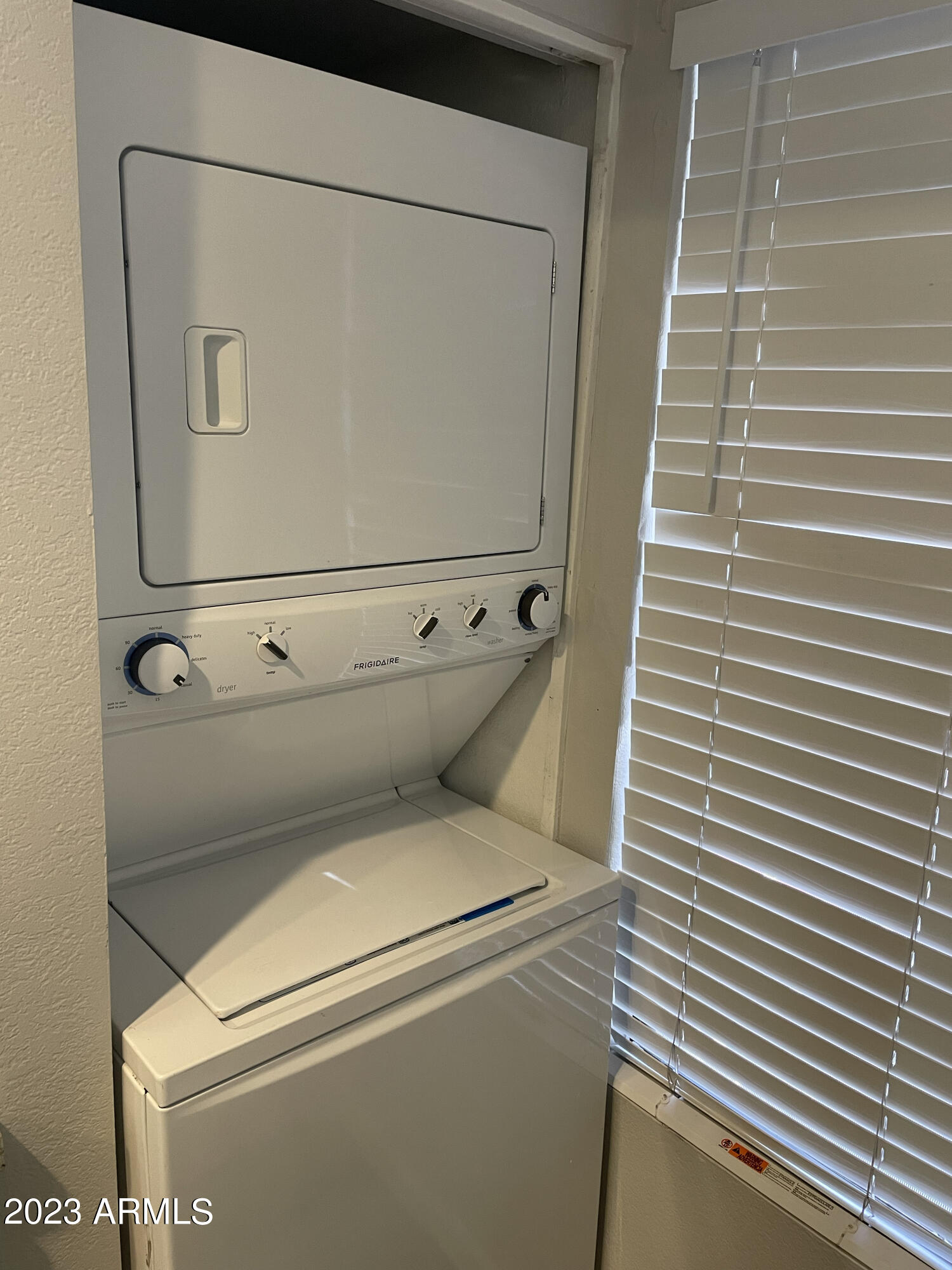 19820 North 13th Avenue, Unit 206 Phoenix, AZ 85027 - Photo 9 of 22 a close up view of washer and dryer