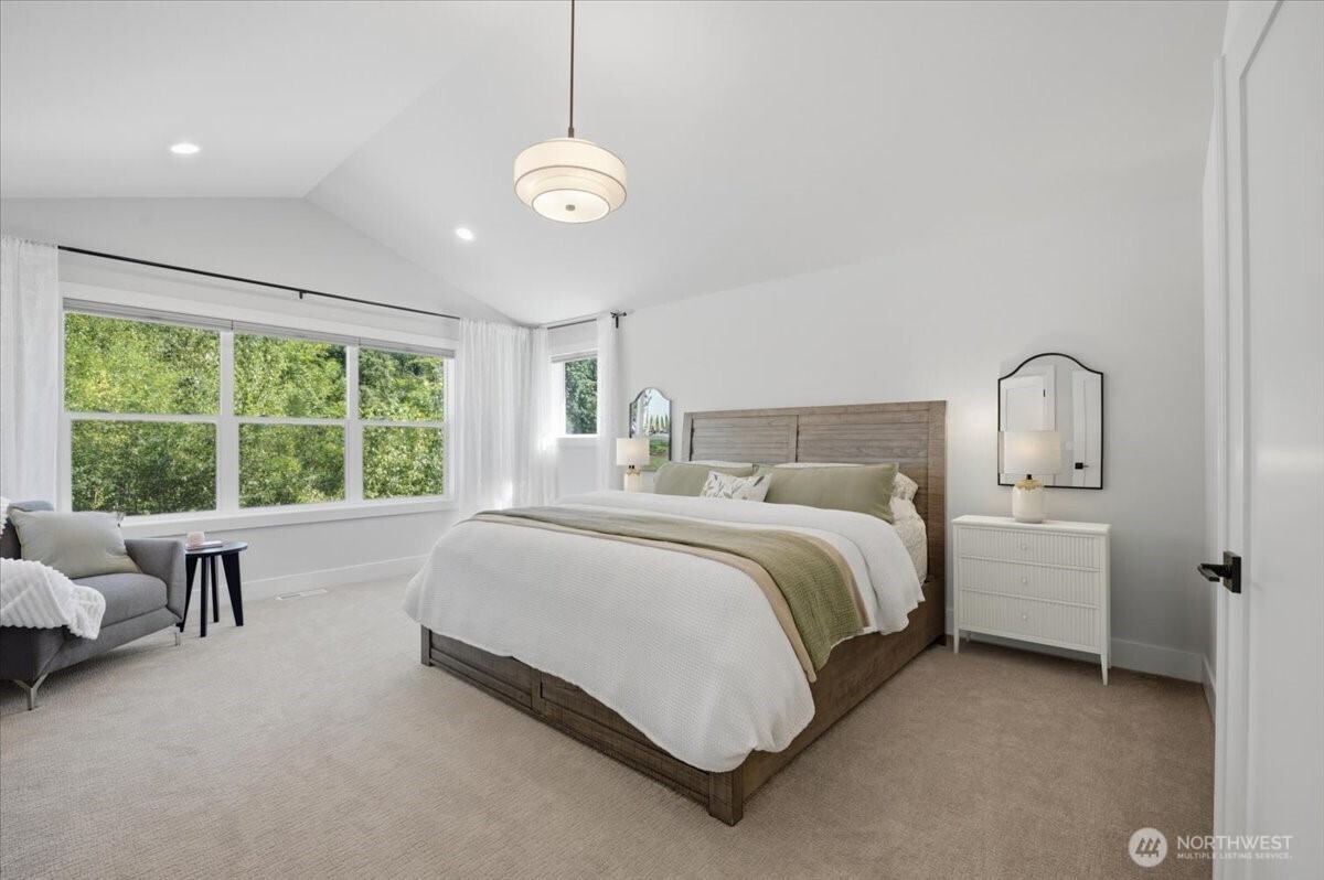 20580 Sinnes Road Mount Vernon, WA 98274 - Photo 29 of 39 a spacious bedroom with a bed and a large window