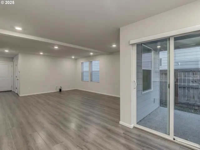 a view of an empty room and window