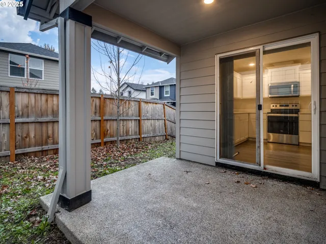 a view of a house with a large window