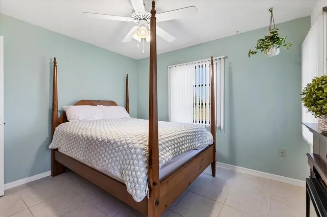 a picture of a counter top space with stainless steel appliances kitchen island granite countertop a refrigerator and a stove