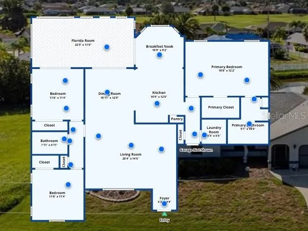 a view of a fountain in front of house with a swimming pool