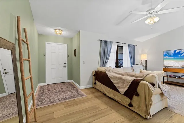 a kitchen with stainless steel appliances a stove microwave and cabinets