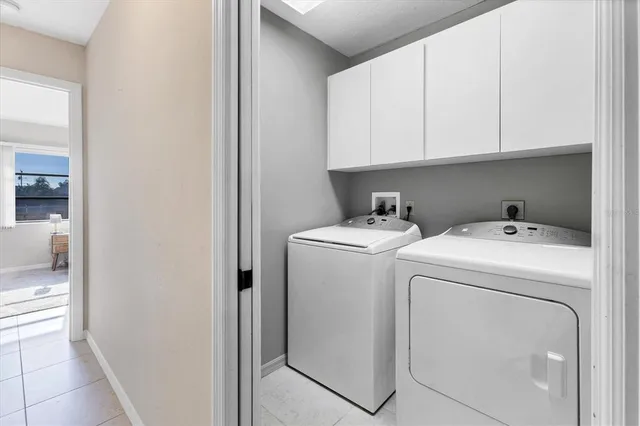 a view of a livingroom with furniture and a window