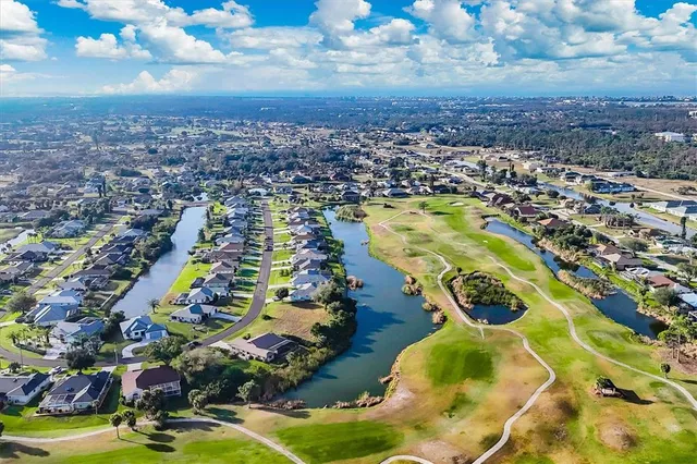 a view of a swimming pool and an outdoor space