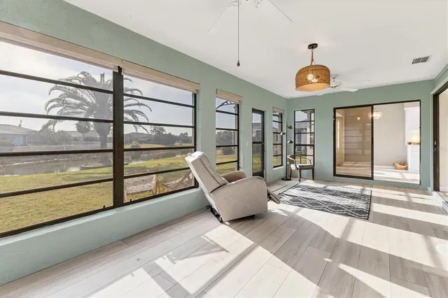 an aerial view of residential houses with yard