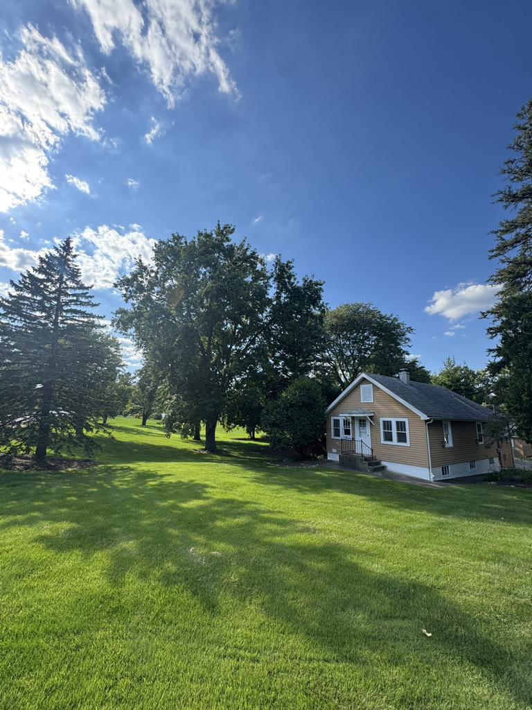 2414 Maple Avenue Downers Grove, IL 60515 - Photo 13 of 17 a view of a house with a big yard