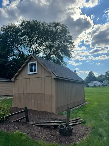 a backyard of a house with lots of green space