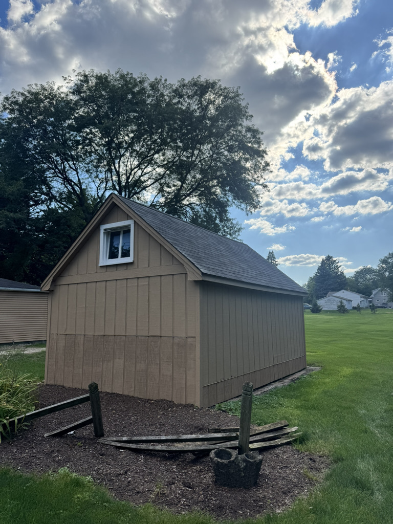 2414 Maple Avenue Downers Grove, IL 60515 - Photo 14 of 17 a backyard of a house with lots of green space