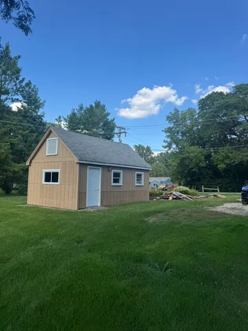a house view with a garden space