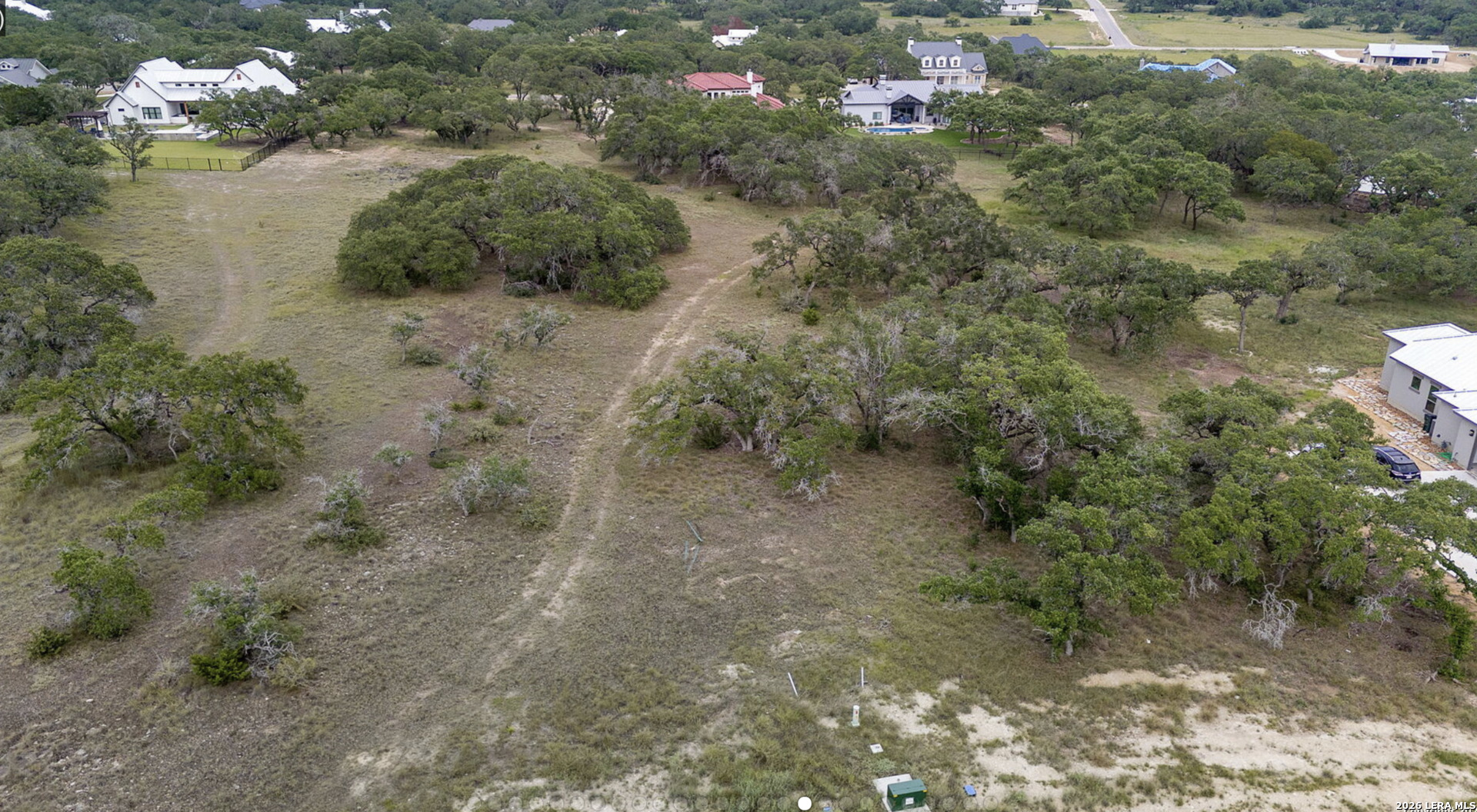 34788 High Gate Road Bulverde, TX 78163 - Photo 13 of 29 a view of a forest with a lake
