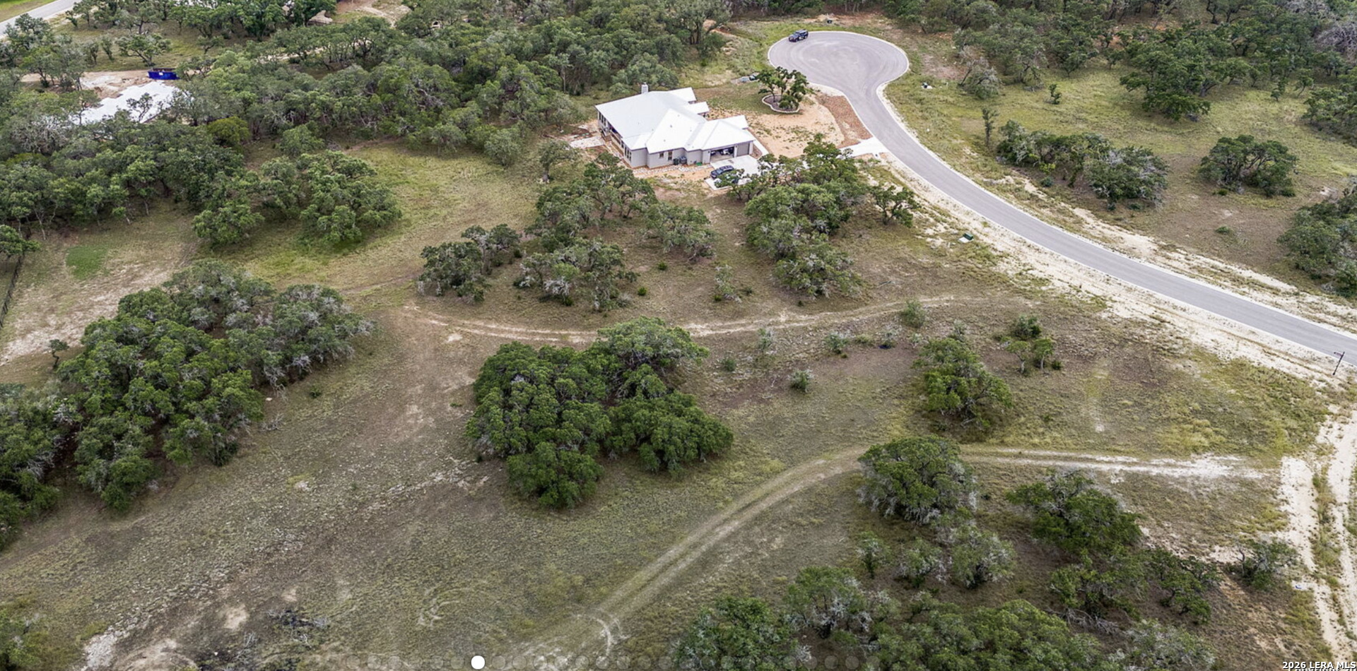 34788 High Gate Road Bulverde, TX 78163 - Photo 19 of 29 an aerial view of a house with a yard