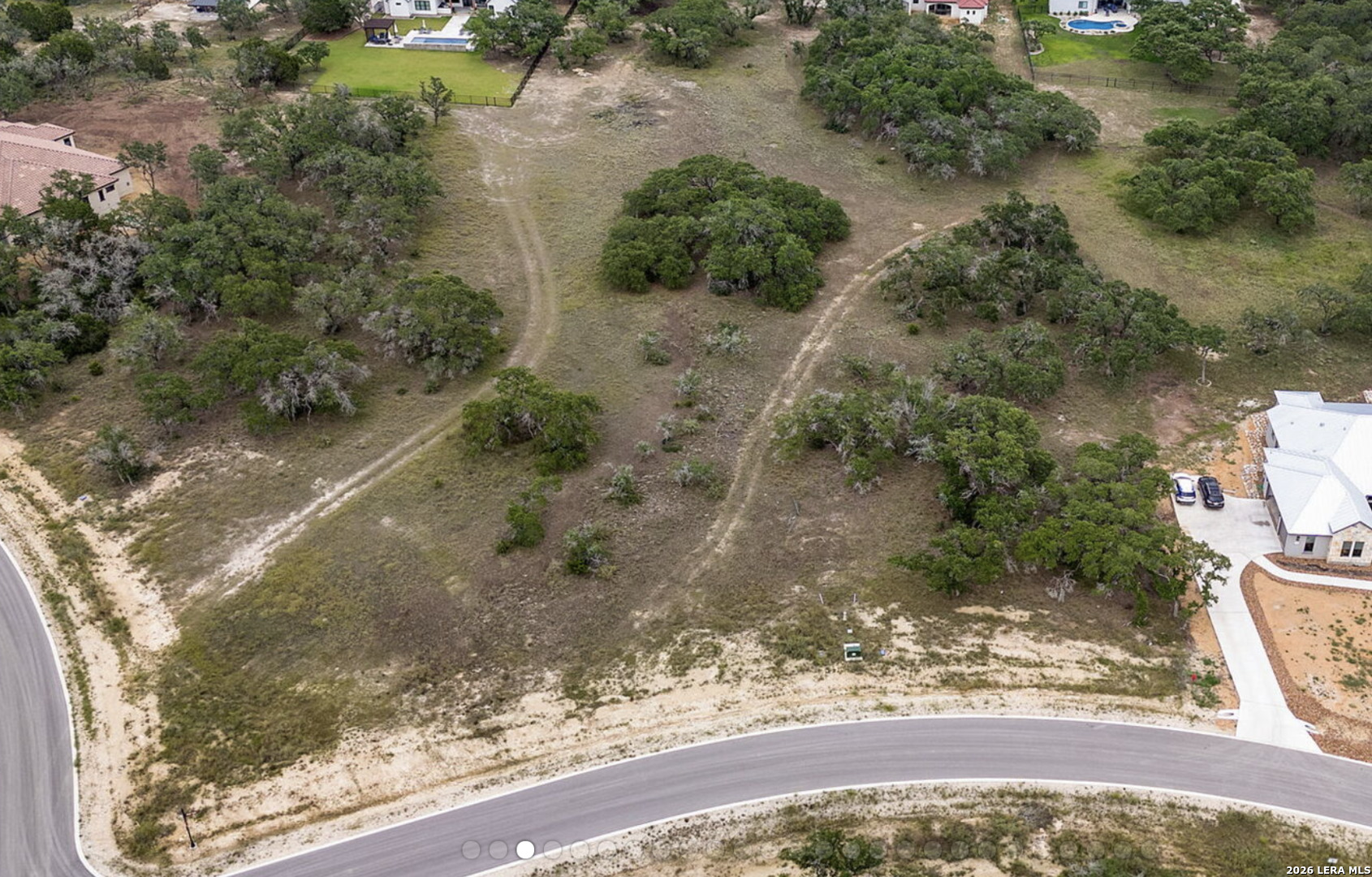 34788 High Gate Road Bulverde, TX 78163 - Photo 23 of 29 a view of a lake with beach