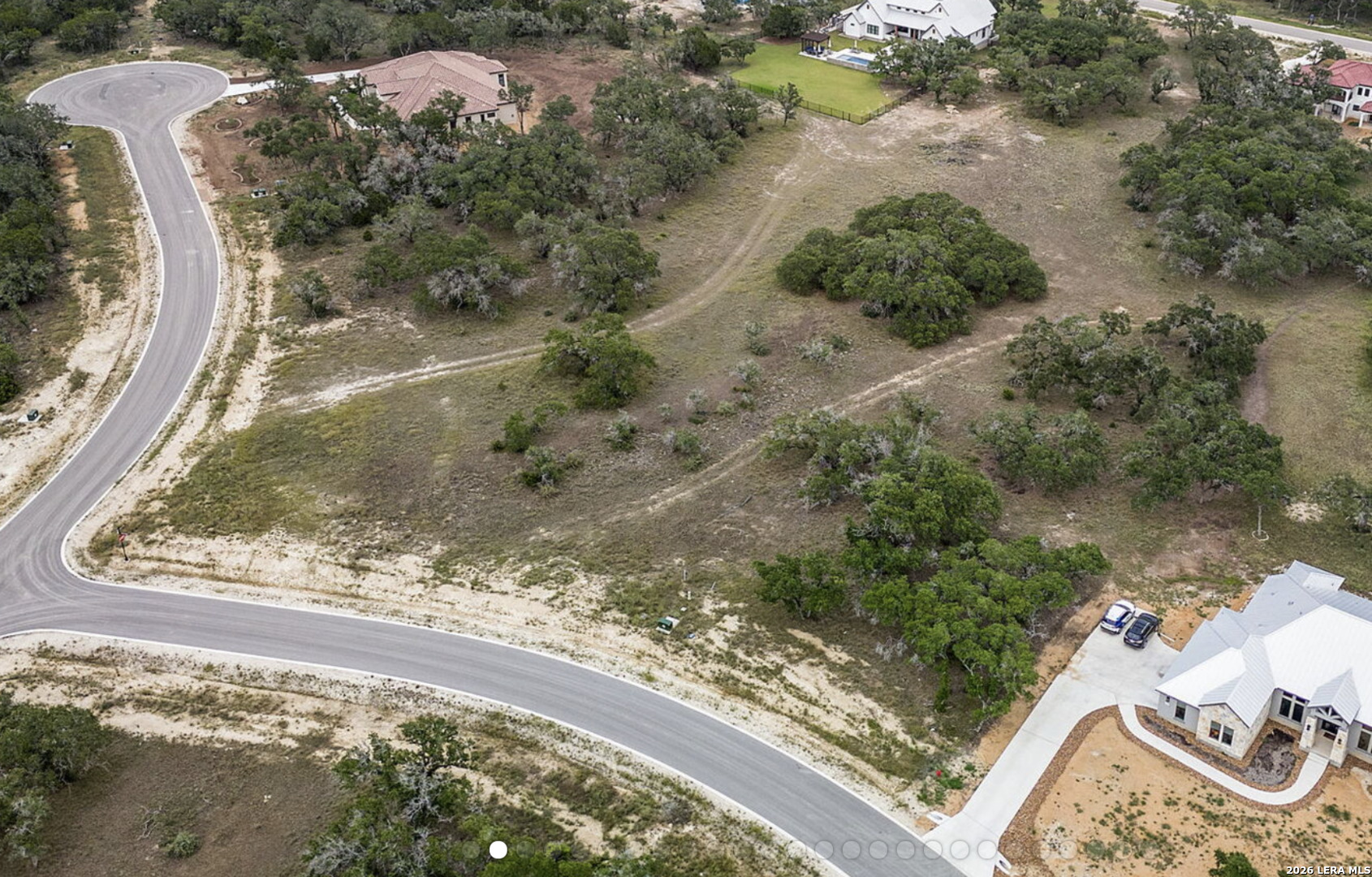 34788 High Gate Road Bulverde, TX 78163 - Photo 3 of 29 a view of a lake with a yard