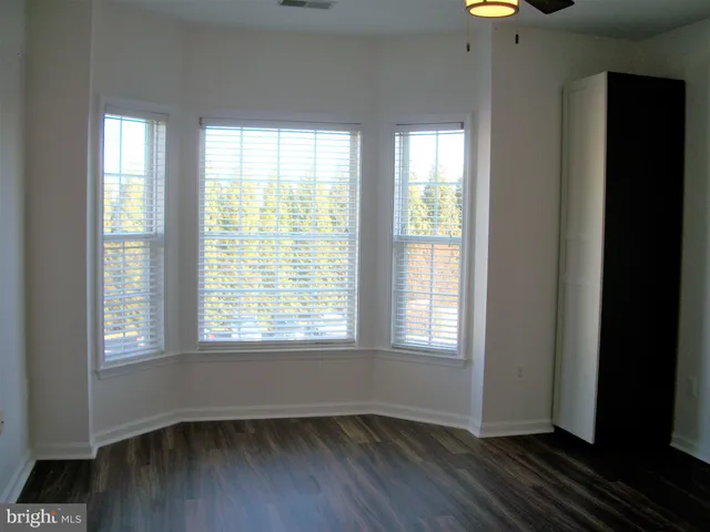 a view of small space with wooden floor