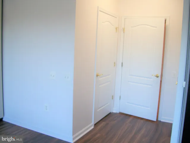 a bathroom with a toilet and a bathtub