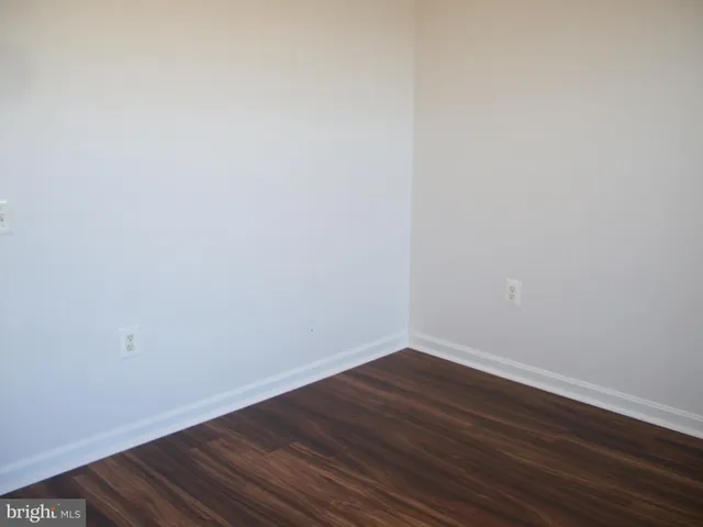 a view of small space with wooden floor